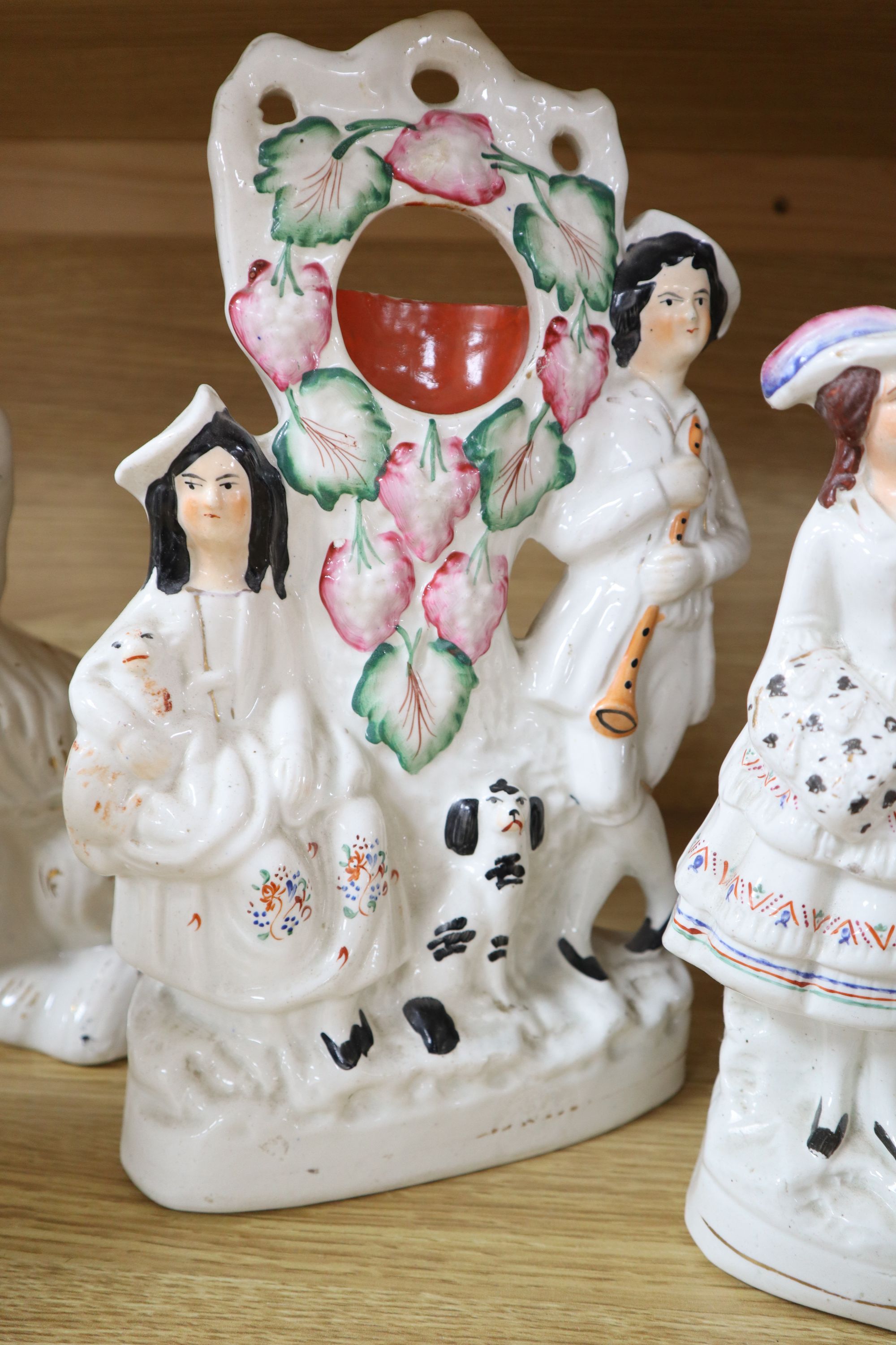 Seven Victorian Staffordshire flatbacks, tallest 33cm